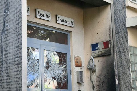 Broken door windows at the Nicolas Louis Vauquelin vocational secondary school in Paris