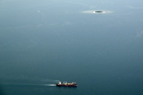 A cargo ship sails towards Nadi Port near Nadi
