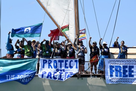 Climate advocates and Greenpeace campaigners sail towards the venue of the Pacific Pre-COP31 Summit in Nadi on October 7, 2026