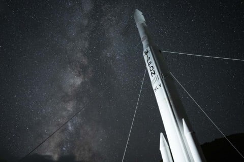 The Milky Way above a rocket model during the Perseid meteor shower at the Tanegashima Space Center in Minamitane, Kagoshima prefecture