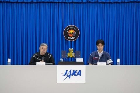 Yasuhiro Kawakatsu (L), project manager of the Mars Moons eXploration (MMX) mission, attends a press conference at the Tanegashima Space Center in Minamitane, Kagoshima prefecture on August 13, 2026