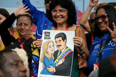 Backers of Nicolas Maduro have rallied in Venezuelan capital Caracas
