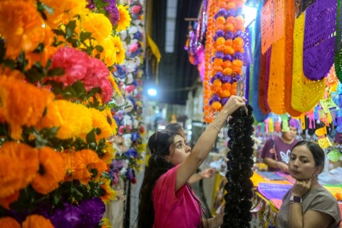 Colorful perforated paper decorations are a central element of Mexico's Day of the Dead celebrations