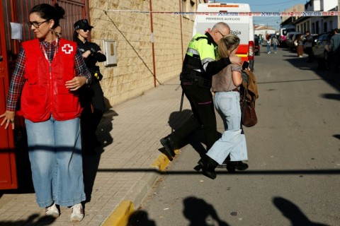 Teams of Red Cross workers offered support to groups of people who arrived, some of them in tears