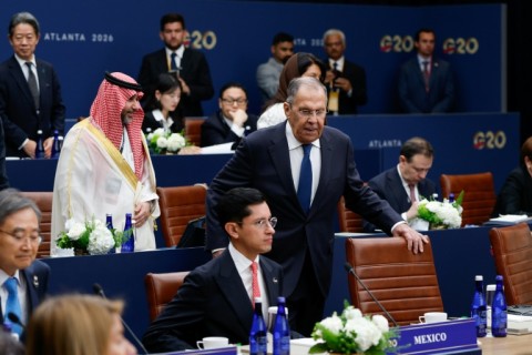 Russia's Foreign Minister Sergey Lavrov arrives to take his seat during the first plenary session at the G20 foreign ministers' meeting in Atlanta, Georgia