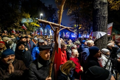 Some of those protesting said prayers while holding Roman Catholic rosaries and religious images