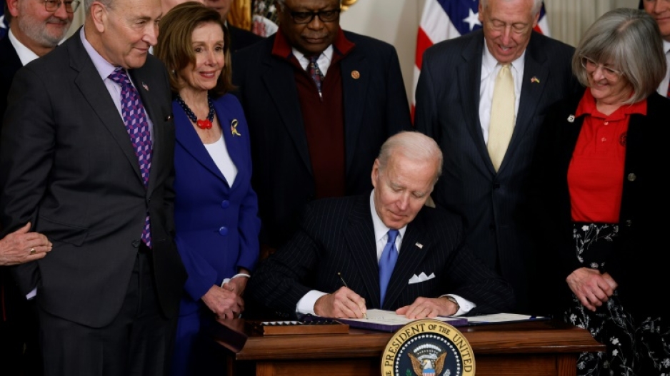 Nancy Pelosi (2nd from left), who has tested positive for Covid, at a White House event with President Joe Biden