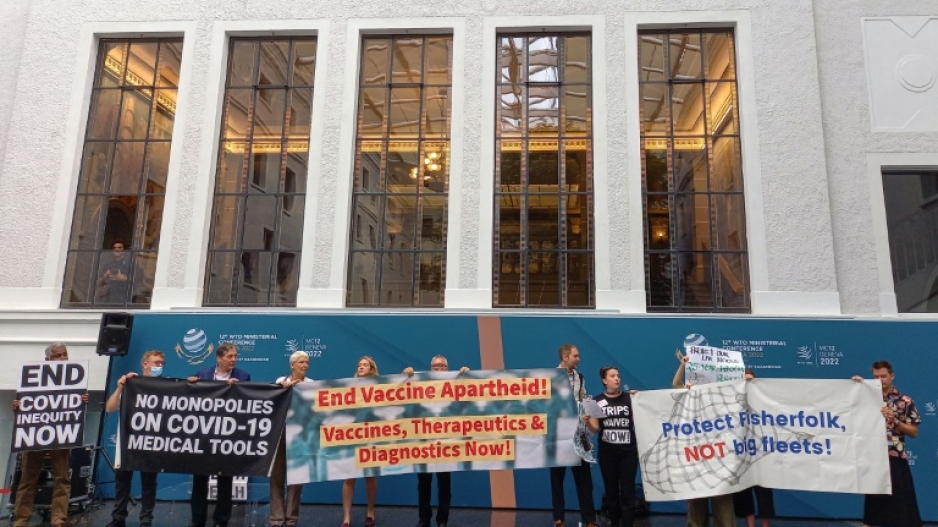Non-governmental organisations staged a protest in the WTO's central atrium, chanting slogans and unfurling banners reading: "No monopolies on Covid-19 medical tools" and "End vaccine apartheid"