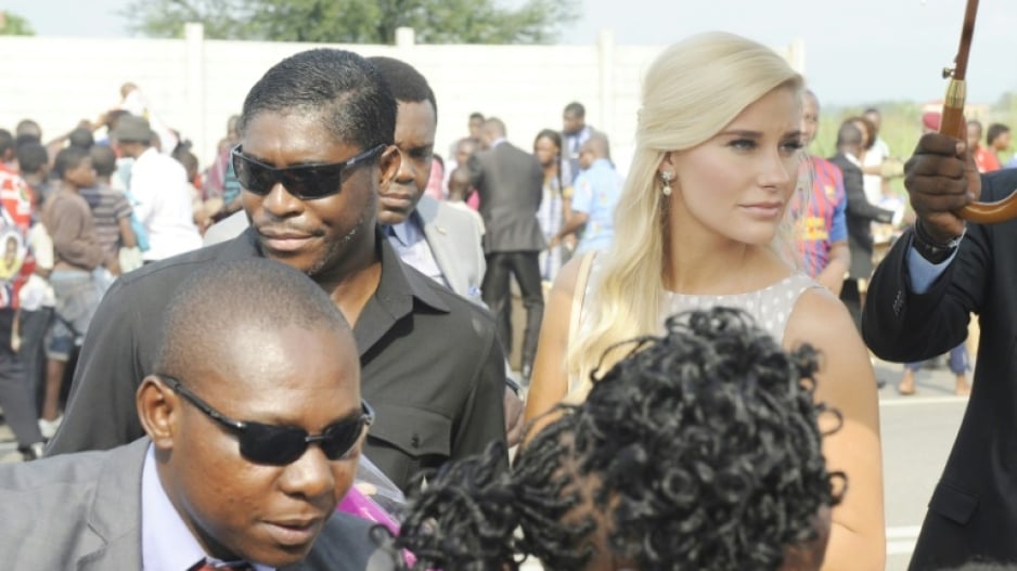 Teodorin, left, pictured alongside girlfriend Christina Mikkelsen, a former Miss Denmark, at a distribution of toys for disadvantaged children in Malabo (2014 file picture)