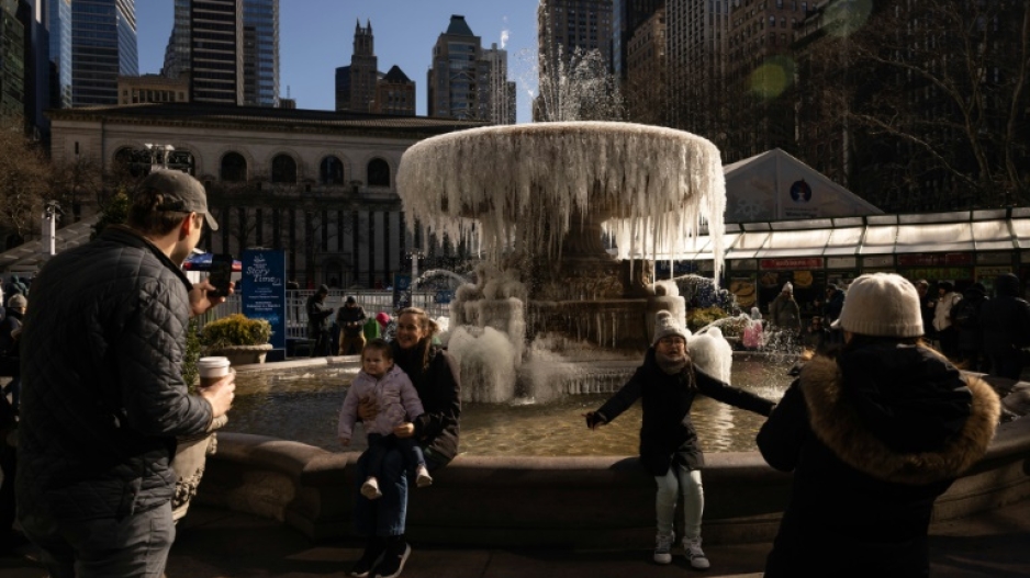 A fountain in New York's Bryant Park is frozen over on February 4, 2023