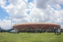 Members of the South African Police Service (SAPS) stand at attention during the Integrated Law Enforcement parade near the Nasrec Expo Centre in Johannesburg, on November 19, 2025.
