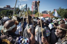 Protestors gather during a protest march against undocumented migrants organised by “March and March” in Johannesburg on April 29, 2026.