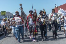 Protestors from the anti-illegal immigration group, March and March Movement chant slogans and march outside the Department of Home Affairs Refugee Reception Centre during a demonstration at the Che Guevara Road in Durban, on October 8, 2026.