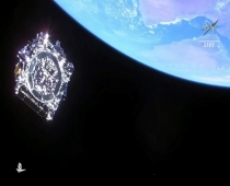 In this still picture from a NASA TV broadcast, the James Webb Space Telescope separates from Arianespace's Ariane 5 rocket after its 2021 launch