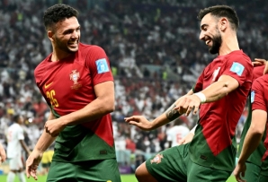 Goncalo Ramos (left) scored a hat-trick as Portugal beat Switzerland 6-1 at the World Cup