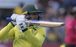 Quinton de Kock of South Africa looks on as he looses his wicket.
