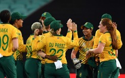 File: South Africa's players celebrate the dismissal of Australia's Jess Jonassen during the Twenty20 women's World Cup semi-final cricket match between Australia and South Africa in Sydney on March 5, 2020.