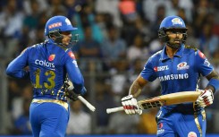 FILE: Mumbai Indians cricketers Quinton de Kock (L) and Suryakumar Yadav run between the wickets during the 2019 Indian Premier League (IPL) Twenty20 cricket match between Mumbai Indians and Sunrisers Hyderabad at the The Wankhede Stadium cricket stadium 