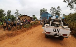 FILE: Moroccan soldiers from the UN mission in DRC (Monusco) ride in a vehicle as they patrol in the violence-torn Djugu territory, Ituri province, eastern DRCongo