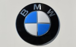 File: The logo of German carmaker BMW. AFP/Christof Stache