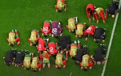 Morocco's players celebrate at the end of the Qatar 2022 World Cup round of 16 football match between Morocco and Spain at the Education City Stadium in Al-Rayyan, west of Doha on December 6, 2022.