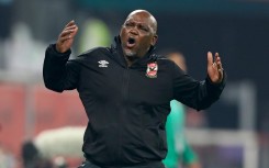 Pitso Mosimane reacts during the FIFA Club World Cup second round football match between Qatar's Duhail and Egypt's Al-Ahly at the Education City Stadium in the Qatari city of Ar-Rayyan on February 4, 2021.