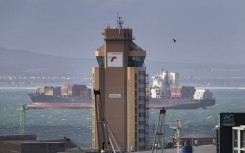 File: A ship moors outside Cape Town harbour, behind the harbour-control tower of Transnet, the State-owned Transport/Logistics company.