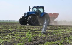 File: A tractor seen on a farm. AFP/Sergey Bobok