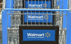 Walmart is seeing elevated demand for grocery items due to inflation, but less interest from consumers in apparel and electronics 