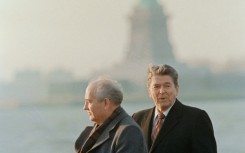 US president Ronald Reagan (R) and his Soviet counterpart Mikhail Gorbachev visit Governors Island on December 7, 1988