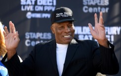 Earnie Shavers waves to the crowd at  the Deontay Wilder v Tyson Fury weigh-in in Los Angeles in 2018