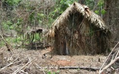 A straw hut in Brazil that was home to "The man of the hole", seen in a screen grab from 2011