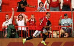 Manchester United's Antony celebrates after scoring against Arsenal