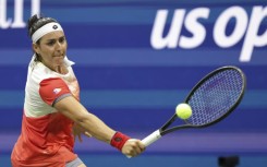 Tunisia's Ons Jabeur hits a return during her US Open quarter-final victory over Ajla Tomljanovic