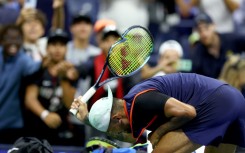 Down and out: Nick Kyrgios 
