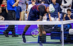 Smashing time: Nick Kyrgios throws his racquet to the ground after losing his quarter-final to Karen Khachanov 