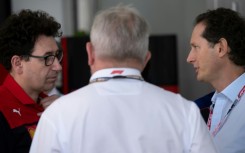 John Elkann (R) says he has faith in Ferrari team principal Mattia Binotto (L) to reconquer the F1 summit