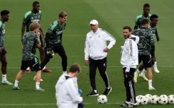 Real Madrid's Italian coach Carlo Ancelotti (C) at training on the eve of their UEFA Champions League match against RB Leipzig