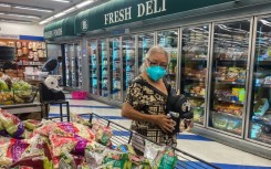 US annual inflation slowed slightly in August, largely thanks to falling gasoline prices -- but prices for food and housing remained high, straining household budgets 