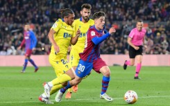 Gavi (R) has already made 54 appearances for the Barcelona first team