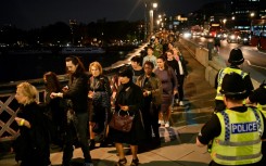 The first public mourners were allowed into the vast medieval Westminster Hall on Wednesday