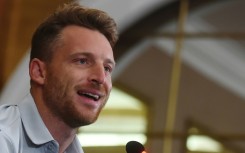 England's Twenty20 captain Jos Buttler speaks during a press conference in Karachi