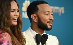 Model Chrissy Teigen (L) has revealed that she underwent a life-saving abortion in 2020 when her pregnancy with husband John Legend was no longer viable and endangering her life