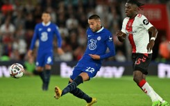 Hakim Ziyech (L) passes for Chelsea against Southampton in the English Premier League.