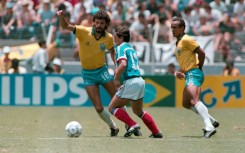 Socrates sidesteps Alain Giresse of France in a World Cup quarterfinal in Mexico in 1986