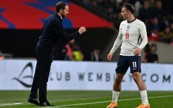 England manager Gareth Southgate gives instructions to Jack Grealish