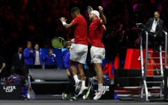 Canada's Felix Auger-Aliassime and USA's Jack Sock of Team World celebrate