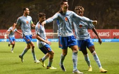 Alvaro Morata (C) snatched a late winner as Spain qualified for the Nations League finals in place of Portugal