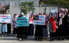 Taliban forces fired shots into the air to disperse a women's rally supporting protests that have erupted in Iran