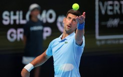 Eye on the ball: Novak Djokovic serves to Roman Safiullin 